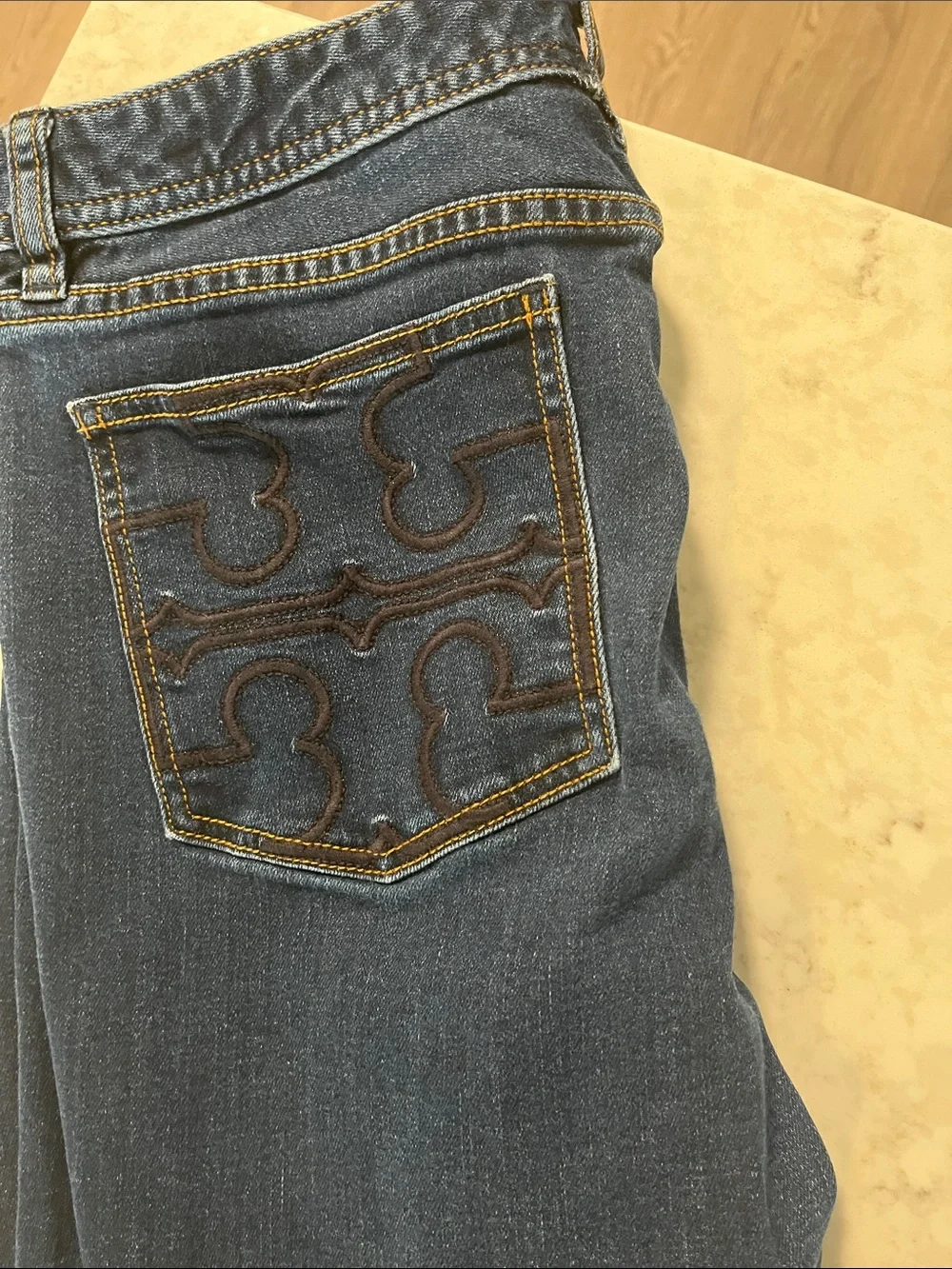 Tory Burch Dark Blue Flare Jeans with Gold Hardware
